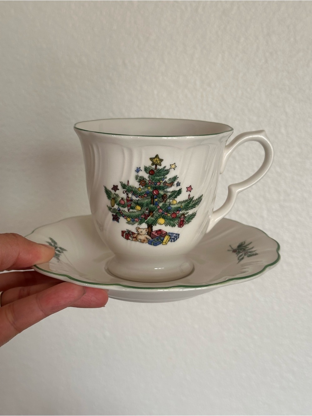 Nikko Ceramics White Teacup and Saucer with Green Trim and Christmas Tree Motif